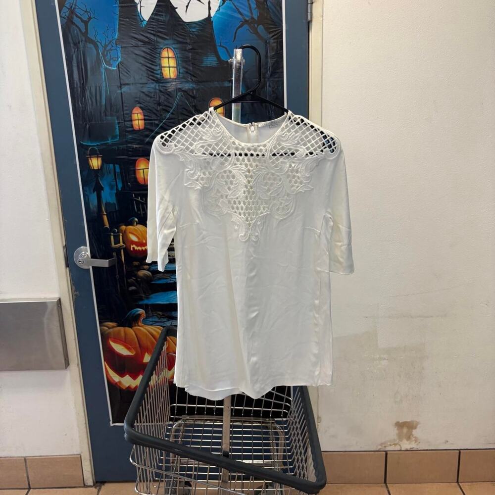 White lace top with cut